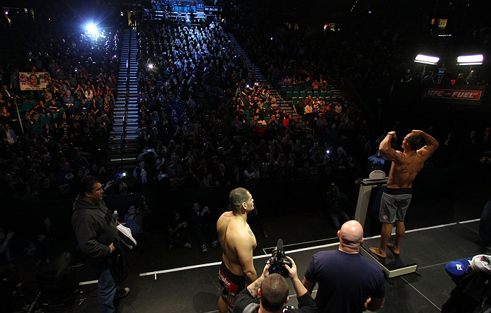 LAS VEGAS, NV - DECEMBER 28: UFC Heavyweight Champion Junior dos Santos (R) weighs in during the UFC 155 weigh-in on December 28, 2012 at MGM Grand Garden Arena in Las Vegas, Nevada. (Photo by Josh Hedges/Zuffa LLC/Zuffa LLC via Getty Images)