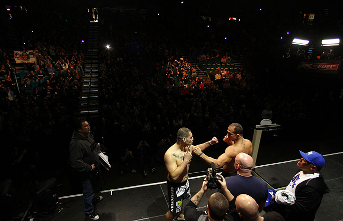LAS VEGAS, NV - DECEMBER 28: (R-L) UFC Heavyweight Champion Junior dos Santos and challenger Cain Velasquez face off during the UFC 155 weigh-in on December 28, 2012 at MGM Grand Garden Arena in Las Vegas, Nevada. (Photo by Josh Hedges/Zuffa LLC/Zuffa LLC via Getty Images)