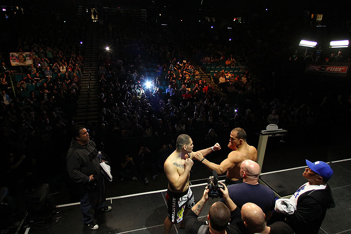 LAS VEGAS, NV - DECEMBER 28: (R-L) UFC Heavyweight Champion Junior dos Santos and challenger Cain Velasquez face off during the UFC 155 weigh-in on December 28, 2012 at MGM Grand Garden Arena in Las Vegas, Nevada. (Photo by Josh Hedges/Zuffa LLC/Zuffa LLC via Getty Images)