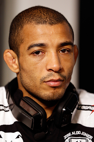LAS VEGAS, NV - JANUARY 31:  UFC featherweight champion Jose Aldo interacts with media during the UFC 156 Ultimate Media Day on January 31, 2013 at the Mandalay Bay in Las Vegas, Nevada.  (Photo by Josh Hedges/Zuffa LLC/Zuffa LLC via Getty Images)