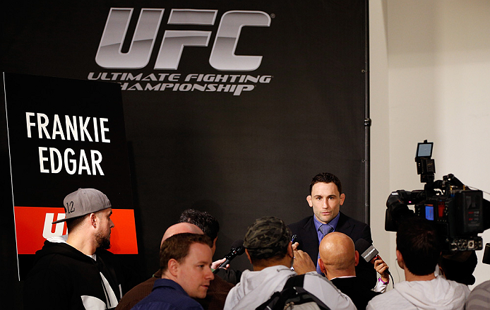 LAS VEGAS, NV - JANUARY 31:  Frankie Edgar interacts with media during the UFC 156 Ultimate Media Day on January 31, 2013 at the Mandalay Bay in Las Vegas, Nevada.  (Photo by Josh Hedges/Zuffa LLC/Zuffa LLC via Getty Images)