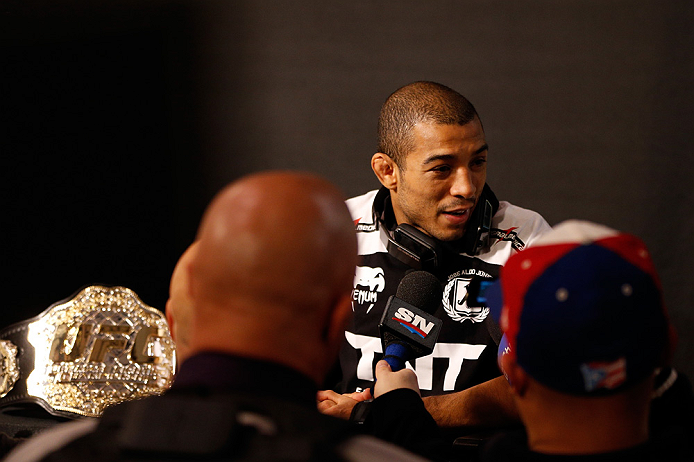 LAS VEGAS, NV - JANUARY 31:  UFC featherweight champion Jose Aldo interacts with media during the UFC 156 Ultimate Media Day on January 31, 2013 at the Mandalay Bay in Las Vegas, Nevada.  (Photo by Josh Hedges/Zuffa LLC/Zuffa LLC via Getty Images)