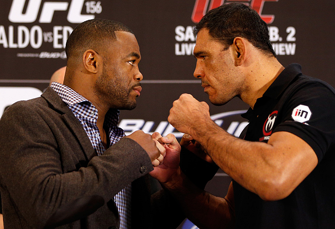 LAS VEGAS, NV - JANUARY 31:  (L-R) Opponents Rashad Evans and Antonio Rogerio Nogueira face off during the UFC 156 Ultimate Media Day on January 31, 2013 at the Mandalay Bay in Las Vegas, Nevada.  (Photo by Josh Hedges/Zuffa LLC/Zuffa LLC via Getty Images)