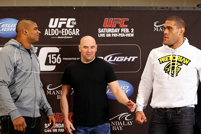 LAS VEGAS, NV - JANUARY 31:  (L-R) Opponents Alistair Overeem and Antonio "Bigfoot" Silva are separated by UFC president Dana White during the UFC 156 Ultimate Media Day on January 31, 2013 at the Mandalay Bay in Las Vegas, Nevada.  (Photo by Josh Hedges/Zuffa LLC/Zuffa LLC via Getty Images)