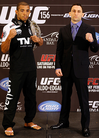 LAS VEGAS, NV - JANUARY 31:  (L-R) Opponents Jose Aldo and Frankie Edgar pose for photos during the UFC 156 Ultimate Media Day on January 31, 2013 at the Mandalay Bay in Las Vegas, Nevada.  (Photo by Josh Hedges/Zuffa LLC/Zuffa LLC via Getty Images)