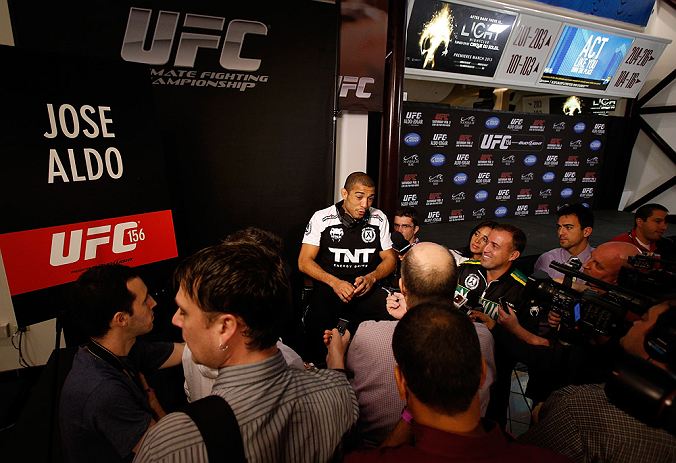 LAS VEGAS, NV - JANUARY 31:  UFC featherweight champion Jose Aldo interacts with media during the UFC 156 Ultimate Media Day on January 31, 2013 at the Mandalay Bay in Las Vegas, Nevada.  (Photo by Josh Hedges/Zuffa LLC/Zuffa LLC via Getty Images)