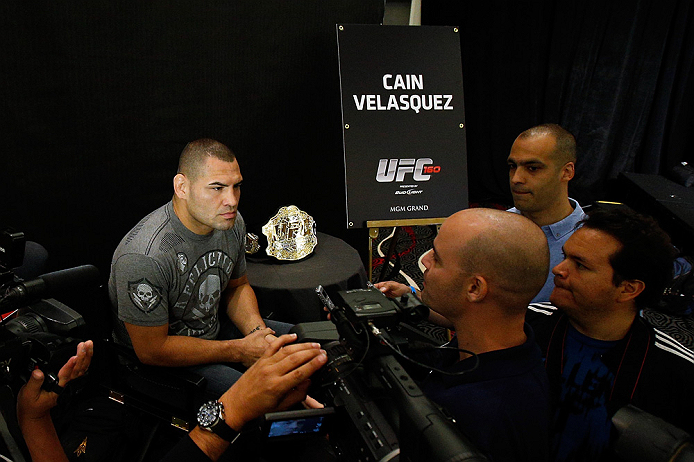 LAS VEGAS, NV - MAY 23:   UFC Heavyweight Champion Cain Velasquez interacts with media during the UFC 160 Ultimate Media Day at the MGM Grand Hotel/Casino on May 23, 2013 in Las Vegas, Nevada.  (Photo by Josh Hedges/Zuffa LLC/Zuffa LLC via Getty Images)