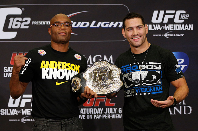 LAS VEGAS, NV - JULY 04:  (L-R) Opponents Anderson Silva and Chris Weidman pose for photos during the final UFC 162 press conference at the MGM Grand Hotel/Casino on July 4, 2013 in Las Vegas, Nevada.  (Photo by Josh Hedges/Zuffa LLC/Zuffa LLC via Getty Images)