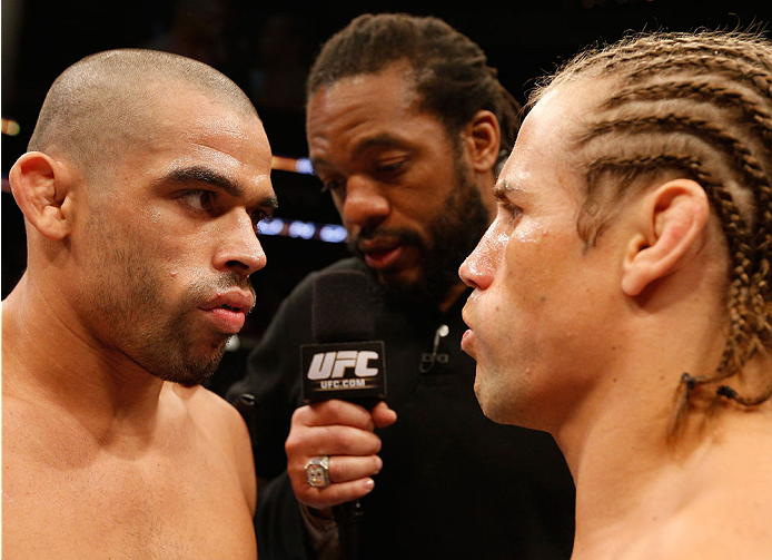 NEWARK, NJ - FEBRUARY 01:  (L-R) Opponents Renan Barao and Urijah Faber face off before their bantamweight championship fight at the UFC 169 event inside the Prudential Center on February 1, 2014 in Newark, New Jersey. (Photo by Josh Hedges/Zuffa LLC/Zuffa LLC via Getty Images)