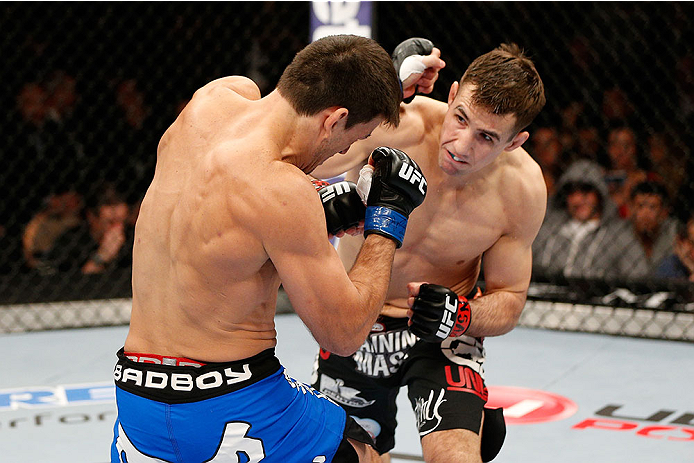 LAS VEGAS, NV - FEBRUARY 22:  (R-L) Rory MacDonald punches Demian Maia in their welterweight bout during UFC 170 inside the Mandalay Bay Events Center on February 22, 2014 in Las Vegas, Nevada. (Photo by Josh Hedges/Zuffa LLC/Zuffa LLC via Getty Images) *** Local Caption *** Rory MacDonald; Demian Maia