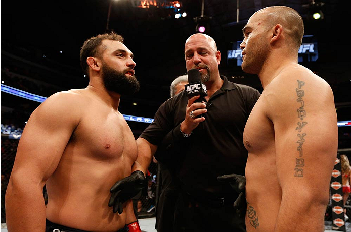 DALLAS, TX - MARCH 15:  (L-R) Opponents Johny Hendricks and Robbie Lawler face off before their UFC welterweight championship bout at UFC 171 inside American Airlines Center on March 15, 2014 in Dallas, Texas. (Photo by Josh Hedges/Zuffa LLC/Zuffa LLC via Getty Images)