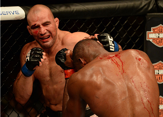 BALTIMORE, MD - APRIL 26:  (L-R) Glover Teixeira punches Jon "Bones" Jones in their light heavyweight championship bout during the UFC 172 event at the Baltimore Arena on April 26, 2014 in Baltimore, Maryland. (Photo by Patrick Smith/Zuffa LLC/Zuffa LLC via Getty Images)