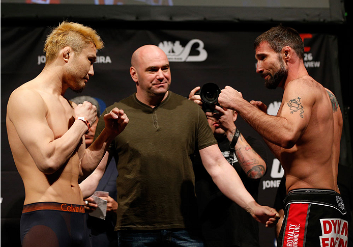 BALTIMORE, MD - APRIL 25: (L-R) Opponents Takanori Gomi and Isaac Vallie-Flagg face off during the UFC 172 weigh-in at the Baltimore Arena on April 25, 2014 in Baltimore, Maryland. (Photo by Josh Hedges/Zuffa LLC/Zuffa LLC via Getty Images)