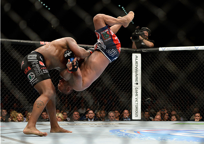 LAS VEGAS, NV - MAY 24: (L-R) Daniel Cormier throws down Dan Henderson in their light heavyweight bout during the UFC 173 event at the MGM Grand Garden Arena on May 24, 2014 in Las Vegas, Nevada. (Photo by Jeff Bottari/Zuffa LLC/Zuffa LLC via Getty Images)