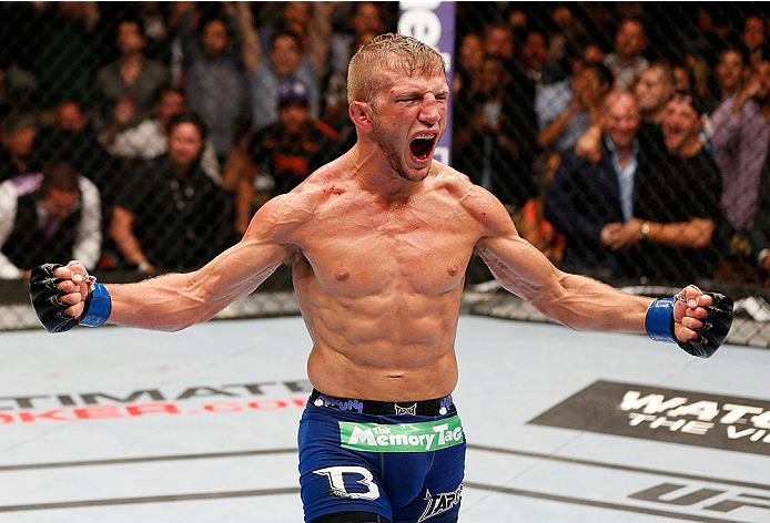 LAS VEGAS, NV - MAY 24:  T.J. Dillashaw reacts to his victory over Renan Barao in their bantamweight championship bout during the UFC 173 event at the MGM Grand Garden Arena on May 24, 2014 in Las Vegas, Nevada. (Photo by Josh Hedges/Zuffa LLC/Zuffa LLC via Getty Images)