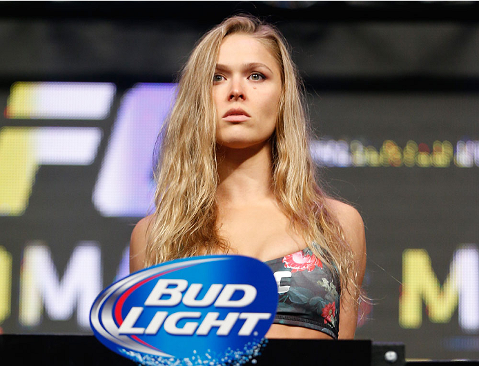 Rousey steps on the scale at UFC 175 weigh-ins