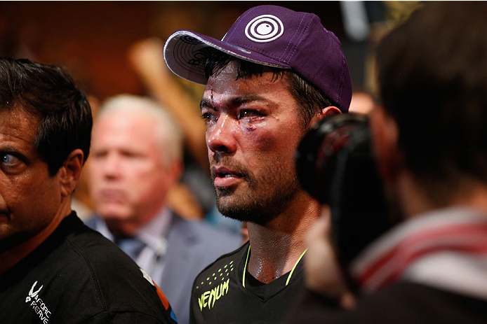 LAS VEGAS, NV - JULY 05:  Lyoto Machida leaves the Octagon after his loss to Chris Weidman in their UFC middleweight championship fight at UFC 175 inside the Mandalay Bay Events Center on July 5, 2014 in Las Vegas, Nevada.  (Photo by Josh Hedges/Zuffa LLC/Zuffa LLC via Getty Images)