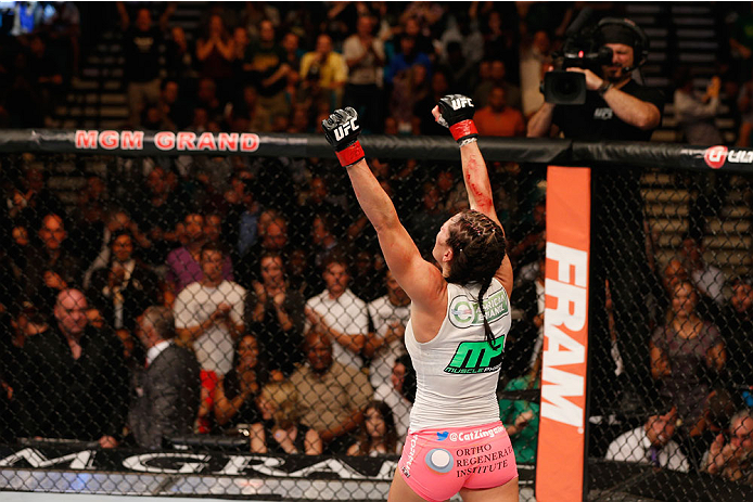 Zingano celebrates her win over Nunes