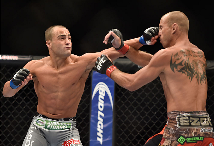 (L-R) Eddie Alvarez punches Donald Cerrone in their lightweight fight during the UFC 178 event inside the MGM Grand Garden Arena on September 27, 2014 in Las Vegas, Nevada. (Photo by Jeff Bottari/Zuffa LLC)