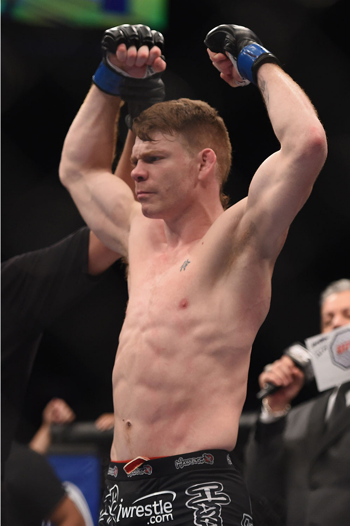 LAS VEGAS, NV - JANUARY 03: Paul Felder celebrates his win over <a href='../fighter/Danny-Castillo'>Danny Castillo</a> in their lightweight bout during the UFC 182 event at the MGM Grand Garden Arena on January 3, 2015 in Las Vegas, Nevada. (Photo by Jeff Bottari/Zuffa LLC)