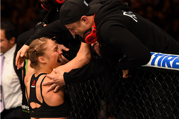 Rousey celebrates her latest win at UFC 184
