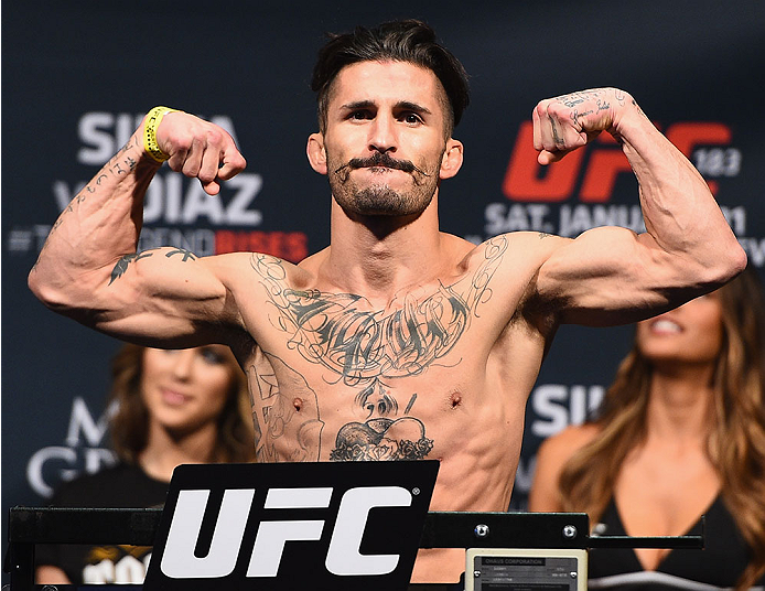 <a href='../fighter/Ian-McCall'>Ian McCall</a> weighs in before his fight with <a href='../fighter/John-Lineker'>John Lineker</a> at UFC 183