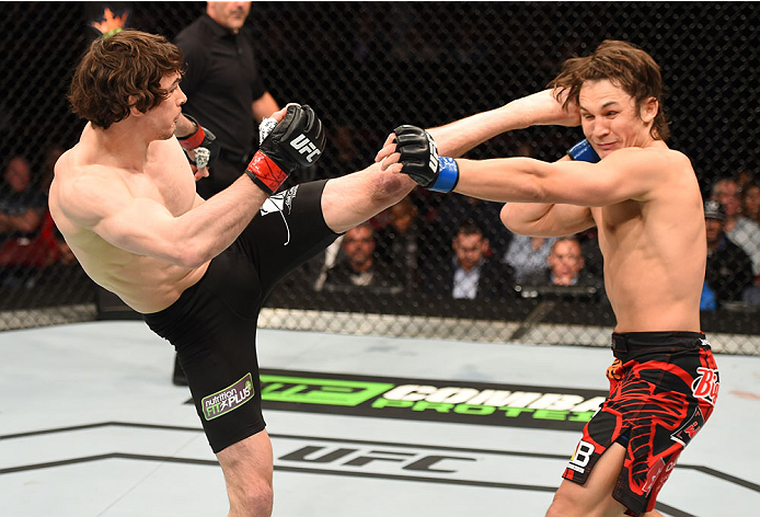 Olivier Aubin-Mercier kicks <a href='../fighter/David-Michaud'>David Michaud</a> in their bout during UFC 186 on 4/25/15 in Montreal, Quebec, Canada. (Photo by Josh Hedges/Zuffa LLC)