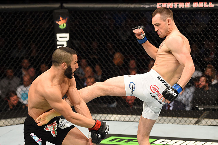 Shane Campbell of the United States kicks John Makdessi of Canada in their catchweight bout during the UFC 186 event at the Bell Centre on April 25, 2015 in Montreal, Quebec, Canada. (Photo by Josh Hedges/Zuffa LLC)
