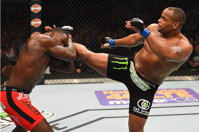 LAS VEGAS, NV - MAY 23: (R-L) Daniel Cormier kicks Anthony Johnson in their UFC light heavyweight championship bout during the UFC 187 event at the MGM Grand Garden Arena. (Photo by Josh Hedges/Zuffa LLC)