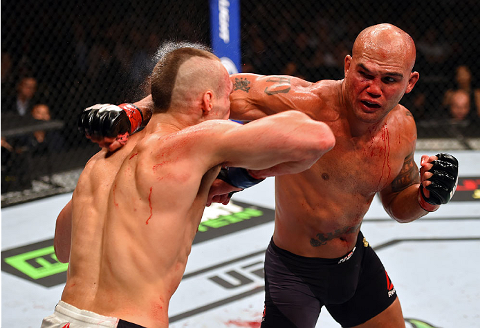 <a href='../fighter/Robbie-Lawler'>Robbie Lawler</a> punches <a href='../fighter/Rory-MacDonald'>Rory MacDonald</a> during their welterweight title fight at UFC 189