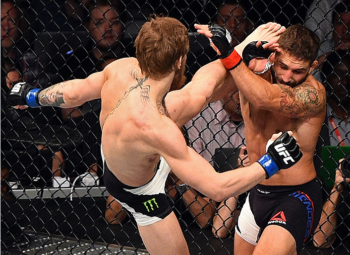 Conor McGregor kicks Chad Mendes during the UFC 189 event inside MGM Grand Garden Arena on July 11, 2015 in Las Vegas, Nevada. (Photo by Jeff Bottari/Zuffa LLC