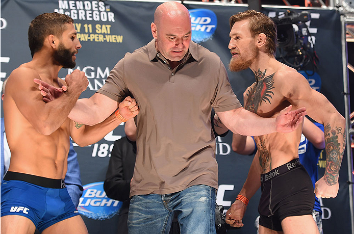(L-R) Chad Mendes and Conor McGregor face off during the UFC 189 weigh-in inside MGM Grand Garden Arena on July 10, 2015 in Las Vegas, Nevada. (Photo by Josh Hedges/Zuffa LLC/Zuffa LLC)