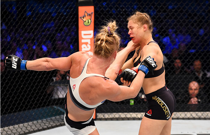 MELBOURNE, AUSTRALIA - NOV. 15: (L-R) Holly Holm lands a left-high kick against Ronda Rousey in the second round of their UFC women's bantamweight championship bout during the UFC 193 event at Etihad Stadium. (Photo by Josh Hedges/Zuffa LLC)