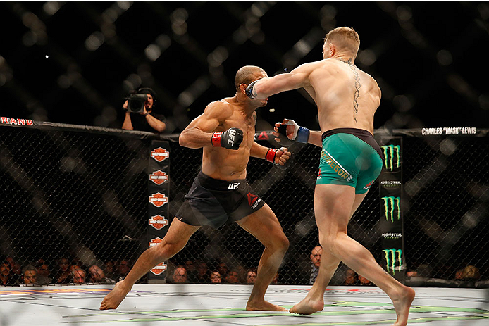 <a href='../fighter/Conor-McGregor'>Conor McGregor</a> knocks out <a href='../fighter/Jose-Aldo'>Jose Aldo</a> just 13 seconds into their featherweight bout at UFC 194