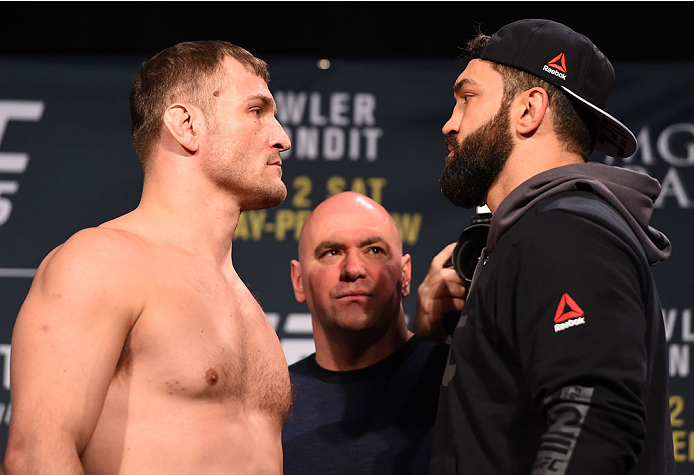 (L-R) Opponents <a href='../fighter/Stipe-Miocic'>Stipe Miocic</a> and Andrei Arlovski of Belarus face off during the UFC 195 weigh-in at the MGM Grand Conference Center on January 1, 2016 in Las Vegas, Nevada. (Photo by Josh Hedges)