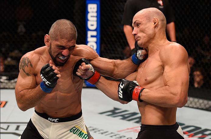 LAS VEGAS, NV: (L-R) <a href='../fighter/Marcelo-Guimaraes'>Marcelo Guimaraes</a> of Brazil and Vitor Miranda of Brazil exchange punches in their middleweight bout during the UFC 196 event inside MGM Grand Garden Arena. (Photo by Josh Hedges/Zuffa LLC)