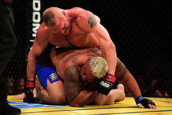 LAS VEGAS, NV - JULY 09: Brock Lesnar (top) punches Mark Hunt of New Zealand in their heavyweight bout during the UFC 200 event on July 9, 2016 at T-Mobile Arena in Las Vegas, Nevada. (Photo by Harry How/Zuffa LLC)