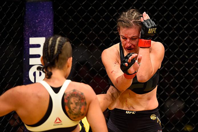 LAS VEGAS, NV - JULY 09: (L-R) Amanda Nunes of Brazil kicks Miesha Tate in their UFC women's bantamweight championship bout during the UFC 200 event on July 9, 2016 at T-Mobile Arena in Las Vegas, Nevada. (Photo by Josh Hedges/Zuffa LLC/Zuffa LLC via Getty Images) *** Local Caption *** Miesha Tate; Amanda Nunes
