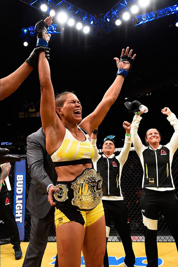 Amanda Nunes celebrates her victory at UFC 200 when she became the women's bantamweight champion