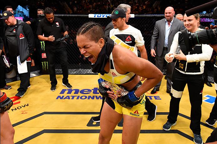 <a href='../fighter/Amanda-Nunes'>Amanda Nunes</a> celebrates after defeating <a href='../fighter/Miesha-Tate'>Miesha Tate</a> for the UFC women's bantamweight title at UFC 200