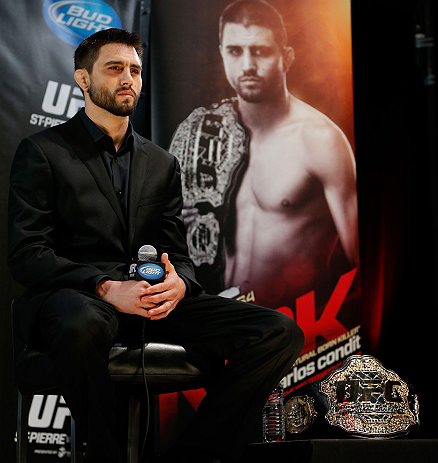 MONTREAL, CANADA - NOVEMBER 14:  Carlos Condit interacts with media and fans during the final pre-fight press conference ahead of UFC 154 at New City Gas on November 14, 2012 in Montreal, Quebec, Canada.  (Photo by Josh Hedges/Zuffa LLC/Zuffa LLC via Getty Images)
