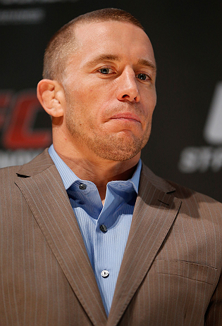 MONTREAL, CANADA - NOVEMBER 14:  Georges St-Pierre interacts with media and fans during the final pre-fight press conference ahead of UFC 154 at New City Gas on November 14, 2012 in Montreal, Quebec, Canada.  (Photo by Josh Hedges/Zuffa LLC/Zuffa LLC via Getty Images)