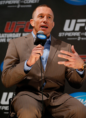 MONTREAL, CANADA - NOVEMBER 14:  Georges St-Pierre interacts with media and fans during the final pre-fight press conference ahead of UFC 154 at New City Gas on November 14, 2012 in Montreal, Quebec, Canada.  (Photo by Josh Hedges/Zuffa LLC/Zuffa LLC via Getty Images)