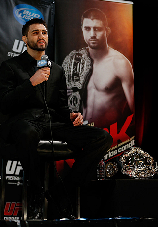 MONTREAL, CANADA - NOVEMBER 14:  Carlos Condit interacts with media and fans during the final pre-fight press conference ahead of UFC 154 at New City Gas on November 14, 2012 in Montreal, Quebec, Canada.  (Photo by Josh Hedges/Zuffa LLC/Zuffa LLC via Getty Images)