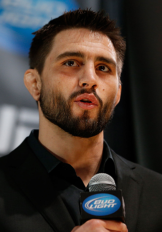 MONTREAL, CANADA - NOVEMBER 14:  Carlos Condit interacts with media and fans during the final pre-fight press conference ahead of UFC 154 at New City Gas on November 14, 2012 in Montreal, Quebec, Canada.  (Photo by Josh Hedges/Zuffa LLC/Zuffa LLC via Getty Images)