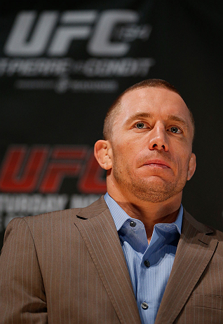 MONTREAL, CANADA - NOVEMBER 14:  Georges St-Pierre interacts with media and fans during the final pre-fight press conference ahead of UFC 154 at New City Gas on November 14, 2012 in Montreal, Quebec, Canada.  (Photo by Josh Hedges/Zuffa LLC/Zuffa LLC via Getty Images)