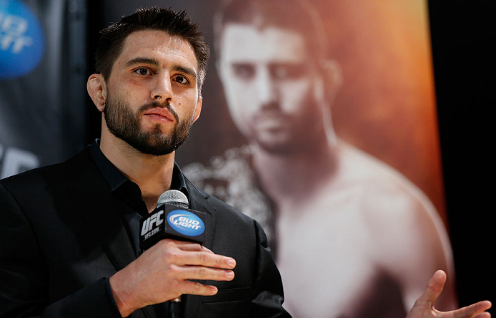 MONTREAL, CANADA - NOVEMBER 14:  Carlos Condit interacts with media and fans during the final pre-fight press conference ahead of UFC 154 at New City Gas on November 14, 2012 in Montreal, Quebec, Canada.  (Photo by Josh Hedges/Zuffa LLC/Zuffa LLC via Getty Images)
