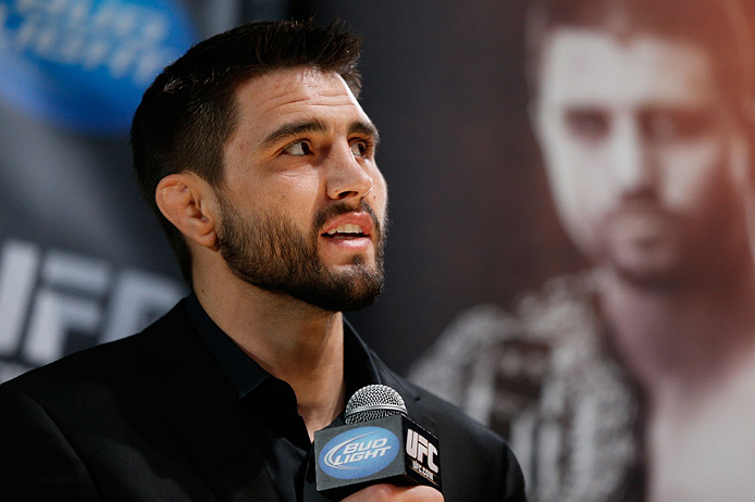 MONTREAL, CANADA - NOVEMBER 14:  Carlos Condit interacts with media and fans during the final pre-fight press conference ahead of UFC 154 at New City Gas on November 14, 2012 in Montreal, Quebec, Canada.  (Photo by Josh Hedges/Zuffa LLC/Zuffa LLC via Getty Images)