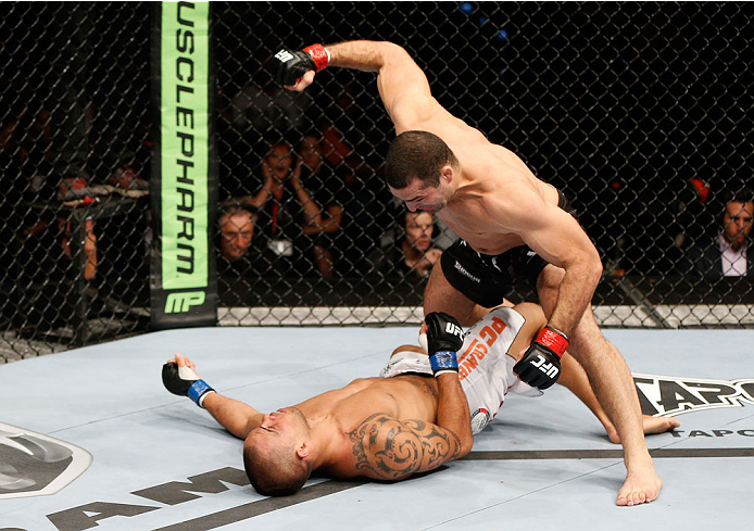 Mauricio 'Shogun' Rua knocks out James Te Huna with a punch in their light heavyweight fight during the UFC Fight Night on December 7, 2013 in Brisbane, Australia. (Photo by Josh Hedges/Zuffa LLC)