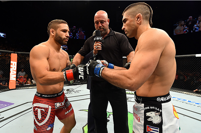FAIRFAX, VA - APRIL 04: (L-R) Chad Mendes and Ricardo Lamas touch gloves before in their featherweight fight during the UFC Fight Night event at the Patriot Center on April 4, 2015 in Fairfax, Virginia. (Photo by Josh Hedges/Zuffa LLC/Zuffa LLC via Getty Images)